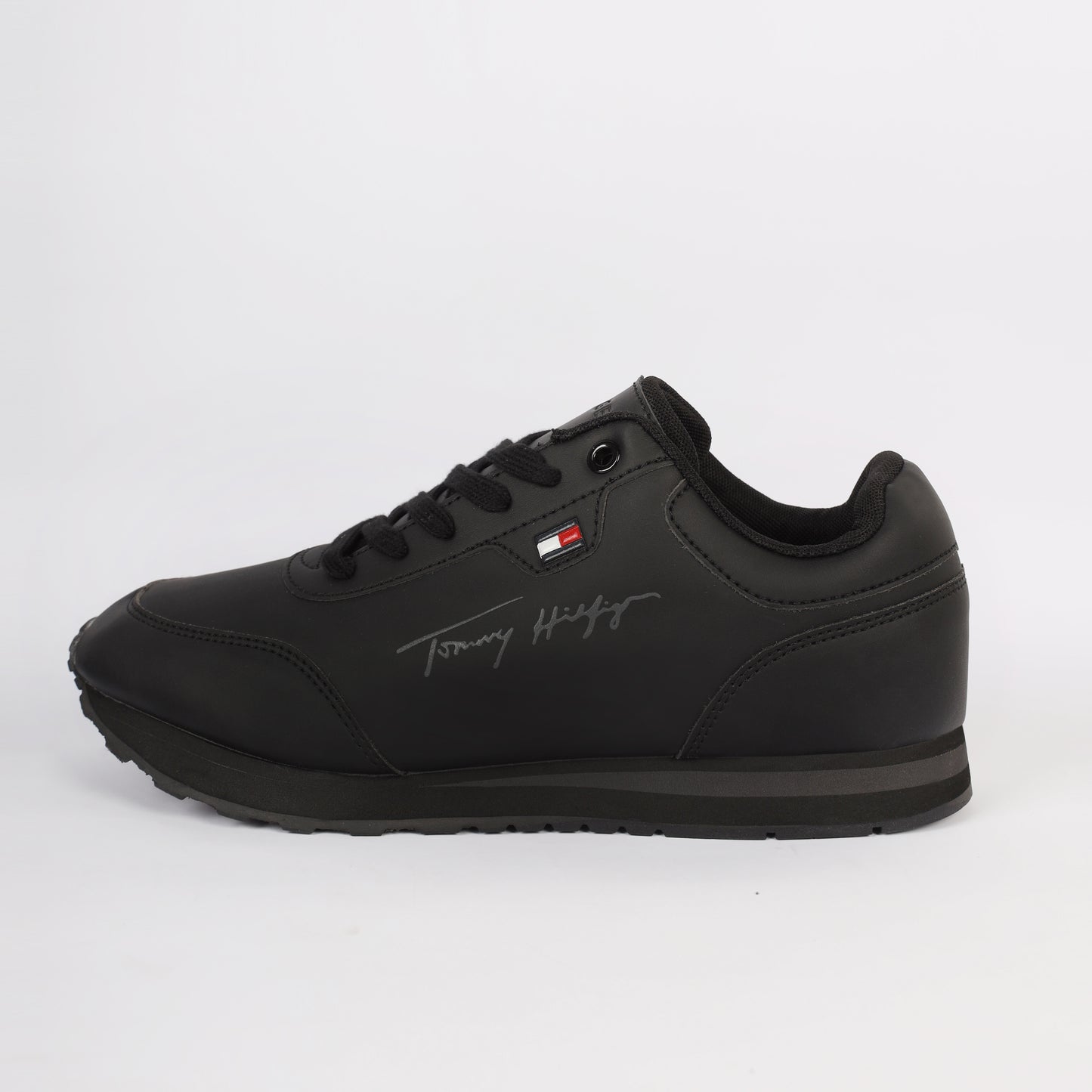 Flag Leather Sneaker" by Tommy Hilfiger. Black