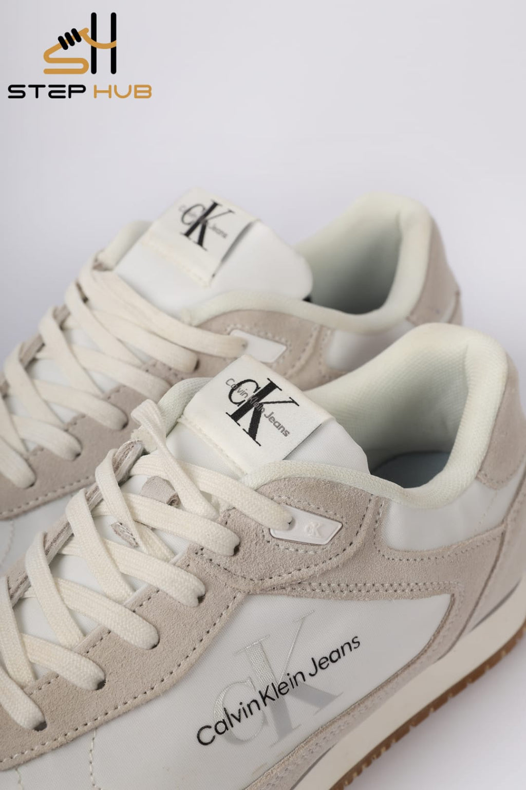 Calvin Klein Jeans Retro Runner Lace-up Trainer. WHITE & BEIGE