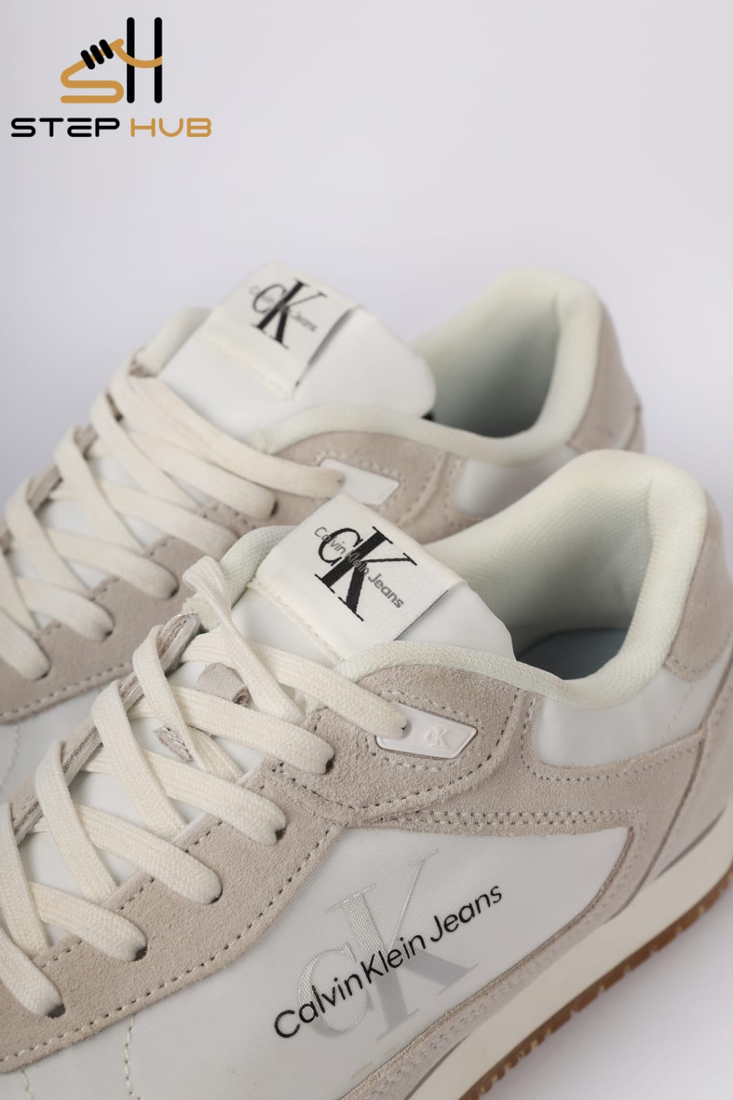 Calvin Klein Jeans Retro Runner Lace-up Trainer. WHITE & BEIGE