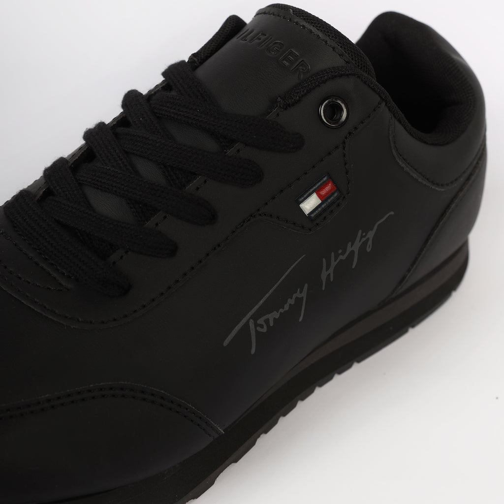 Flag Leather Sneaker" by Tommy Hilfiger. Black